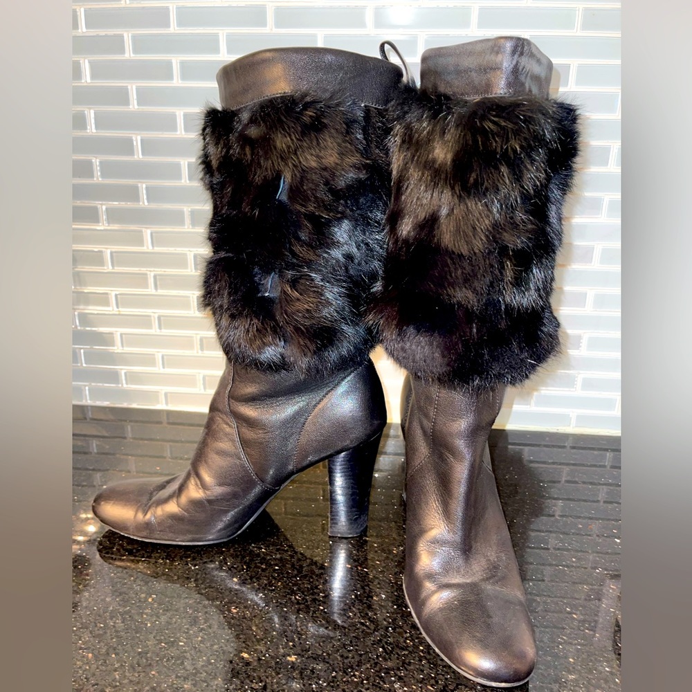 Leather boots with fur embellishment